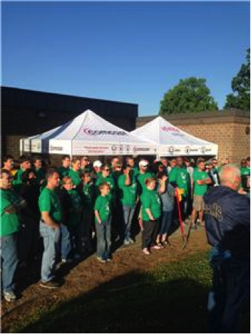 A large group of Comcast Cares Day volunteers.